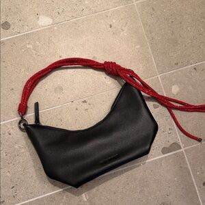 Black Bag with Red Strap